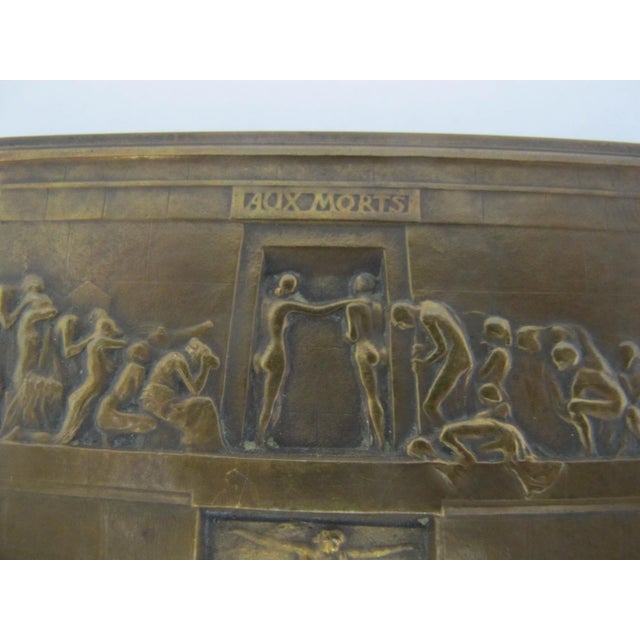 Bronze miniature reproduction plaque of the famous Aux Morts (To the Dead) funerary monument in Paris’s Père-Lachaise...