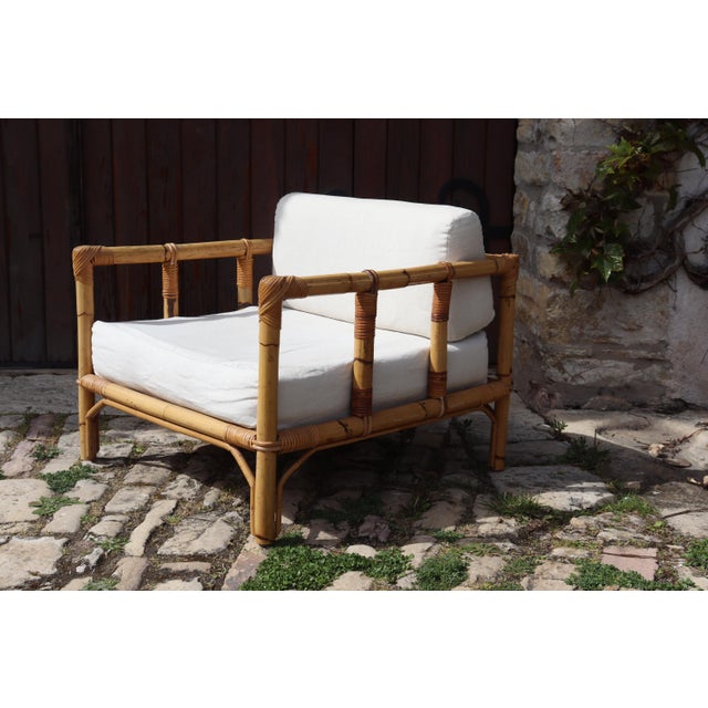 Italian armchair in rattan and bamboo. By Dal Vera. Circa 1970. Both the seat and backrest are still very firm and...