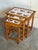 A versatile set of three space-saving accent tables engineered to slide neatly beneath one another. Turned legs provide...