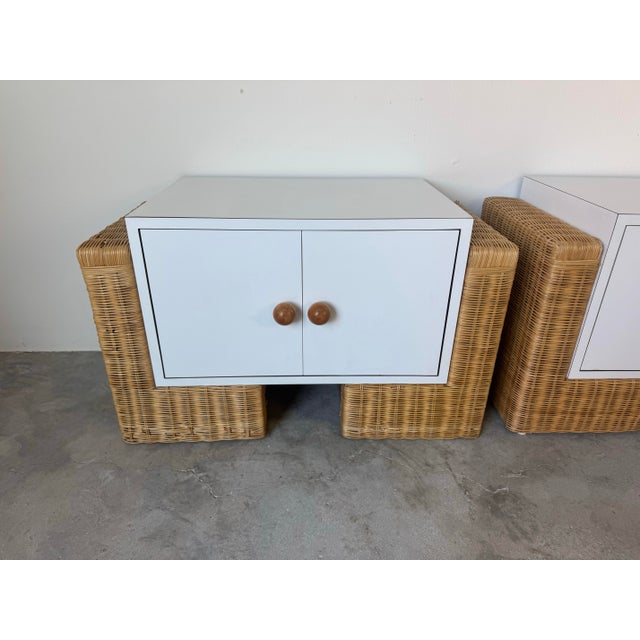 This stylish pair of 1980s vintage nightstands features a distinctive Boho Chic design with sculptural woven rattan bases...