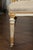 A pair of Italian 1790s neoclassical painted and carved side chairs with shield backs and traces of gilt. This pair of...