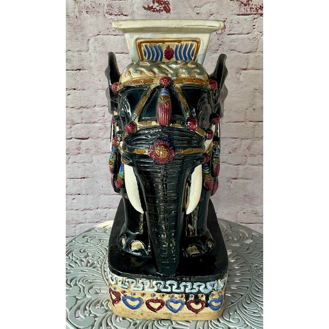 20th Century Vintage Ceramic Elephant Garden Stool. Heavy stool is hand-painted in traditional Chinese palette of black,...