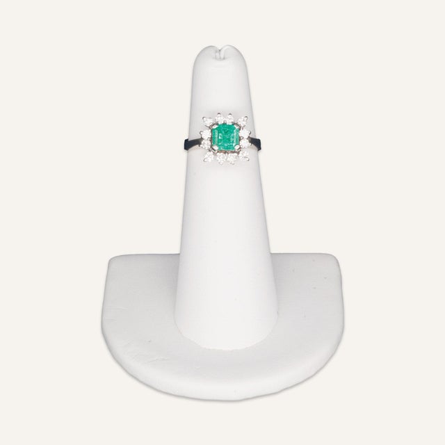 This is part of Chairish’s Fine Jewelry assortment. One emerald and diamond ring set in 14k white gold. The emerald...