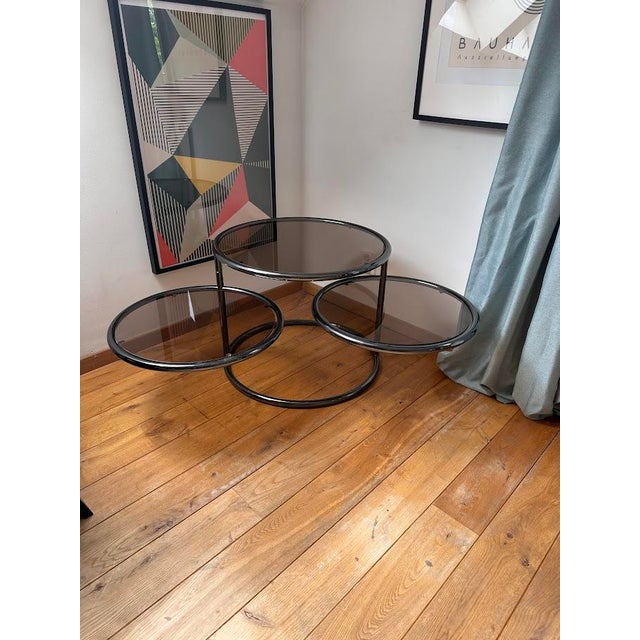 An impressive cocktail table in the Hollywood Regency style, inspired by the luxurious design aesthetics of the 1970s....