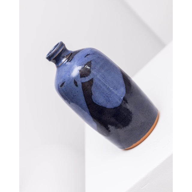 Interesting, shapely and hand-turned vase from the pottery Wolfgang Thibault, marketed underside with 'TW'. Intense dark...