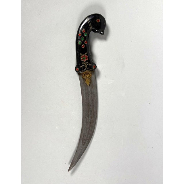 INDIA, Rajasthan. KARD Mughal Dynasty (1526-1857) The handle is carved in spinach-green jade with a bird's head, adorned...
