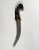 INDIA, Rajasthan. KARD Mughal Dynasty (1526-1857) The handle is carved in spinach-green jade with a bird's head, adorned...
