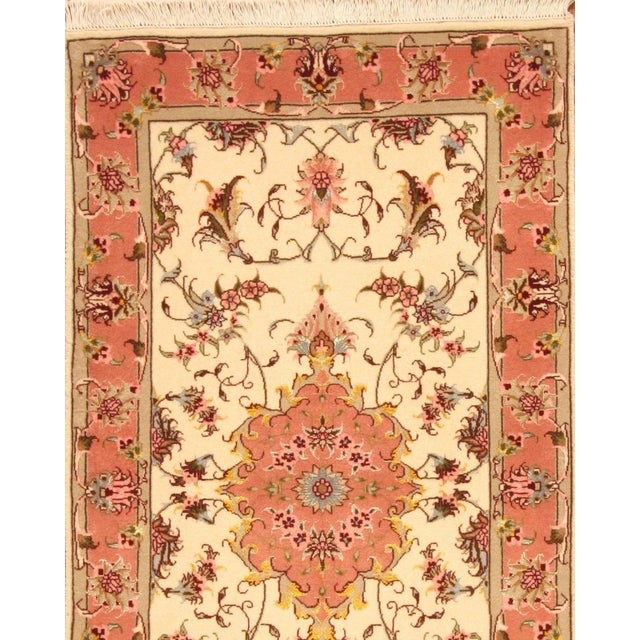 Hand-knotted oriental rug | size: 125cm x 70cm | knot density: approx. 550,000 knots/m² | material: 97% wool, 3% silk |...