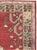 This mid-20th-century Turkish Anatolian wide gallery runner presents a bold, symmetrical composition across a rich brick-...