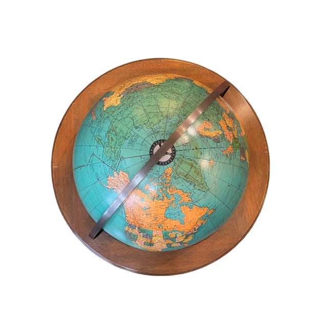 Elevate your decor with this exquisite Globe in Rolling Stand with Brass Hardware. Crafted with precision and...