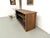 A piece of vintage craftsmanship with raw, functional charm. This 1950s shop counter, crafted from pine, has retained all...