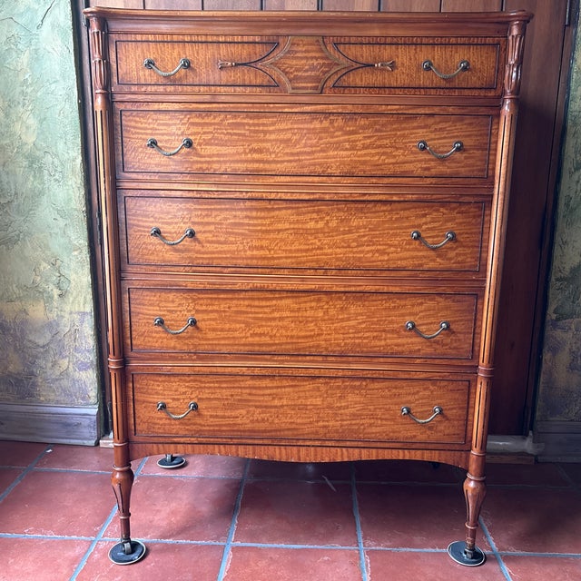 1930’s John Widdicomb highboy chest of drawers on wheels. First and second drawer have dividers. Beautiful details.