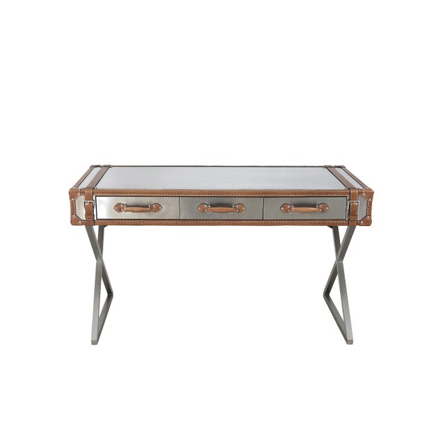 "Introducing the Brookline steel and leather writing desk – a breathtaking fusion of functionality and style that...