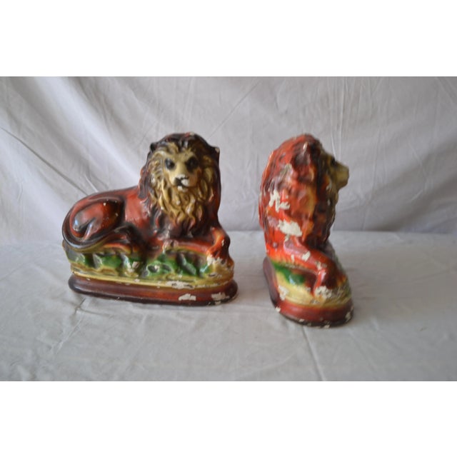 1930's Pair of lions from Ireland. They have natural distressed wear which makes them all the more charming.