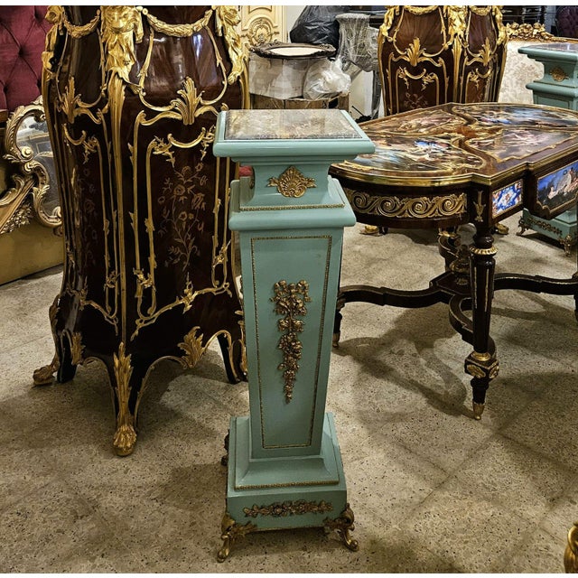 Elevate your space with this stunning French Rococo style pedestal column, featuring a bold black finish and a more...