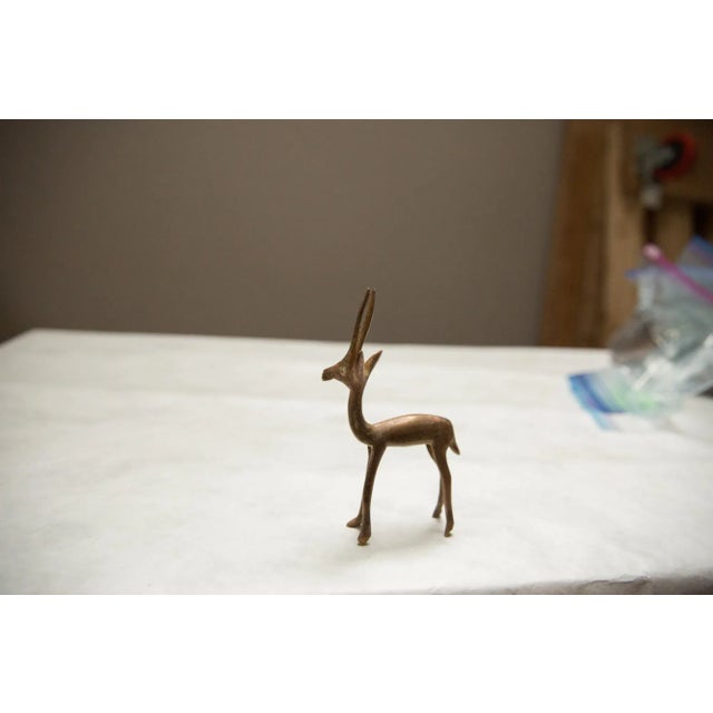 :: Vintage handmade African copper right facing gazelle. Circa mid 20th century and possibly older, this piece has such...