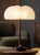Hana md table lamp in borosilicate glass & brass finish by schwung dimensions: ø 34 x h 48,5 cm materials: borosilicate...