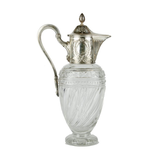 Late 19th century Victorian crystal pitcher with Sterling silver mounted collar and hinged lid, United Kingdom By: unknown...