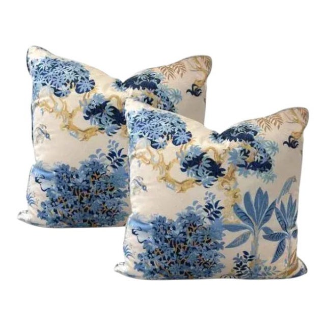 Elevate your space with this stunning pair of throw pillows featuring a bold Thibaut fabric Chinoiserie-inspired print in...