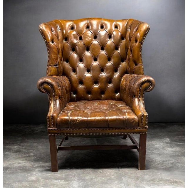 Wingback armchairs, also known as fireside chairs, emerged in England in the early 18th century. Their high backs and...