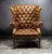 Wingback armchairs, also known as fireside chairs, emerged in England in the early 18th century. Their high backs and...