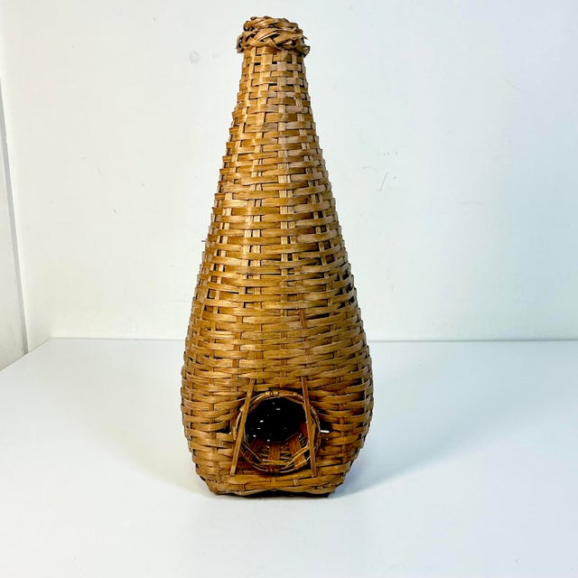 Be honest. We didn’t know what this was when we found it. But it’s a vintage wicker eel trap. They would be set in water...