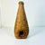 Be honest. We didn’t know what this was when we found it. But it’s a vintage wicker eel trap. They would be set in water...