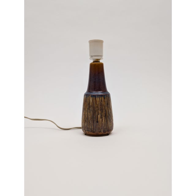 Experience the exquisite beauty of the Manilla series with these two small table lamps,one is slightly taller than the...