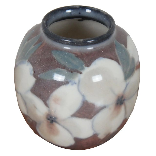 Antique 1944 Rookwood Pottery porcelain vase with a floral design by Jens Jensen featuring white dogwood or magnolia...
