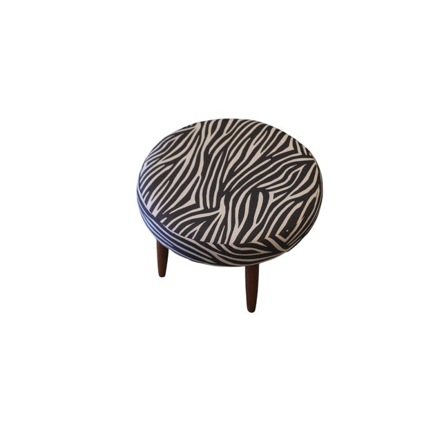 A round Danish stool that truly becomes the room's little jewel, a small pattern that catches the eye and adds both...