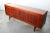 This Norwegian sideboard or credenza was produced & designed by Westnofa Furniture in the 1950s. The sideboard has a...