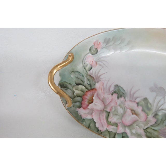 This stunning Limoges plate is made of porcelain and was produced by Gérard, Dufraisseix, & Abbot (GDA) in France. GDA...