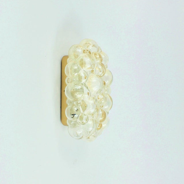 Beautiful high-end bubble glass wall light designed by helena tynell for limburg (germany, 1960s). Hand blown light...