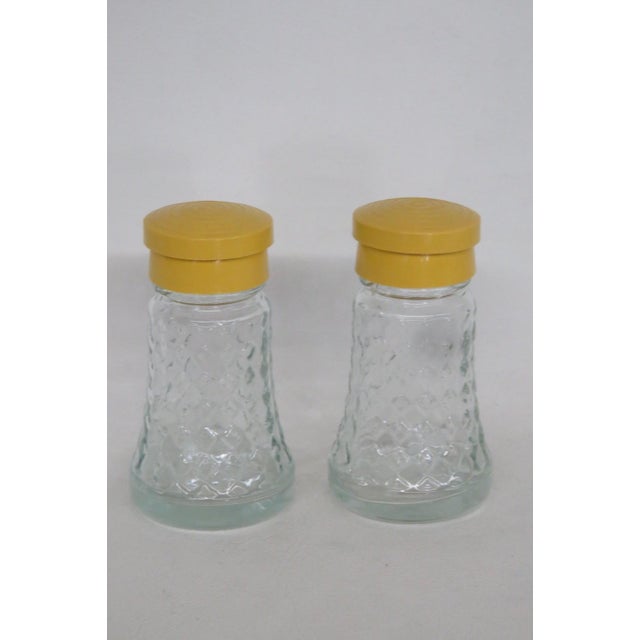 Mid-Century Modern Mid 20th Century Daniells Mid Century Modern Yellow Flip Top Glass Salt and Pepper Shaker Pair For Sale - Image 3 of 14
