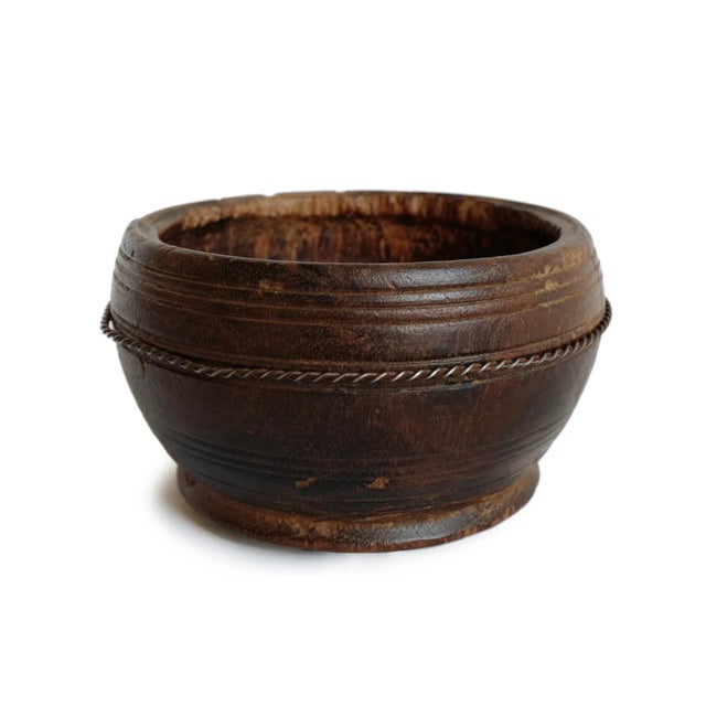 Old wood village bowl from Nepal. Beautiful collectors piece with indigenous repairs and signs of age and use. Rich patina...