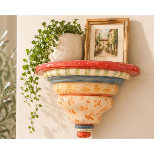 Handcrafted decorative wall shelf or architectural wall bracket signed and dated “Nance Aitchison 1998.” This sculptural...