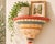 Handcrafted decorative wall shelf or architectural wall bracket signed and dated “Nance Aitchison 1998.” This sculptural...