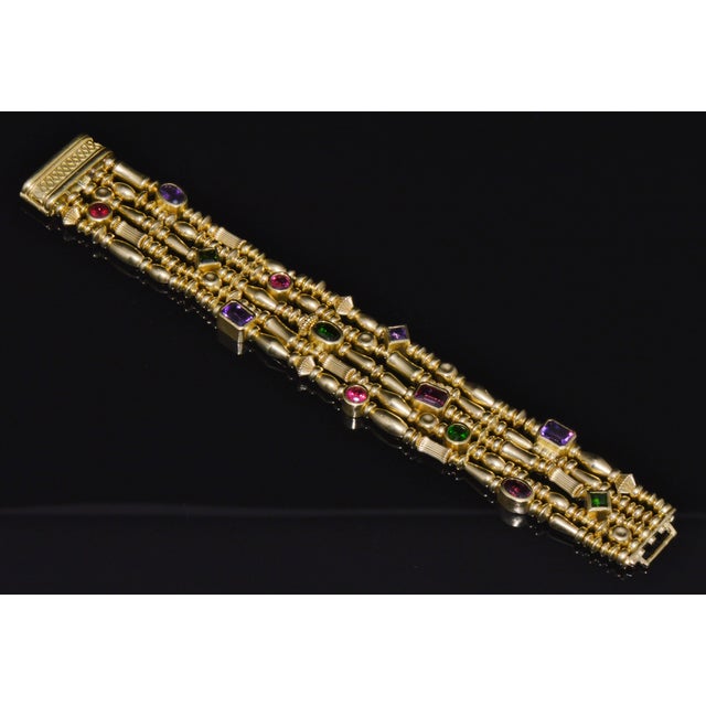 Beautiful SeidenGang 18K solid gold multi-row bracelet set with natural multi-colored gemstones. This exceptional designer...