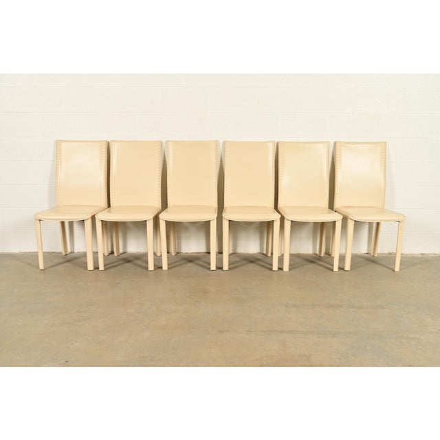 A sleek and stylish set of six Italian Modern or Postmodern high back dining chairs In the manner of Mario Bellini for...