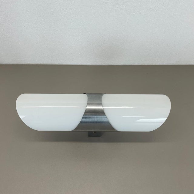 Article: wall light with satin white glass shade Origin: ITALY Age: 1970s This modernist light was produced in ITALY in...
