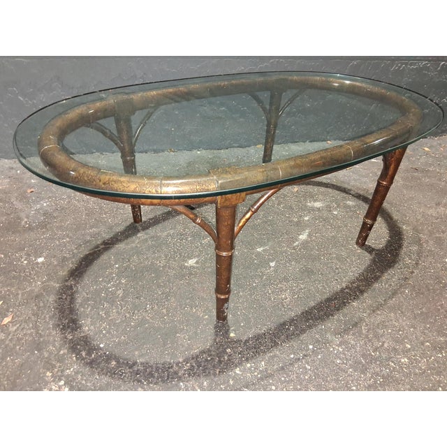 1940's Hollywood Regency Faux Tortoise Shell/ Bamboo Coffee/ Cocktail Table. Carved wood, thick glass top. Stunning faux...