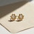 Sculptural Moissanite Lotus Stud Earrings. Textured Lotus Flower Stud Earrings with Pear-Cut Moissanites. Nature-Inspired...