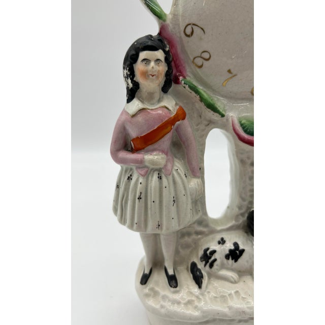 A Antique English Staffordshire Watch Figure circa 1860's Made in the Staffordshire district of Stoke on Trent, England,...