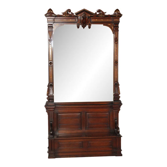 Late 19th Century Monumental American Victorian Renaissance Carved Walnut Hall Bench With Mirror For Sale