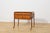 This teak consol was manufactured in Denmark during the 1960s. The piece represents the characteristic qualities of...