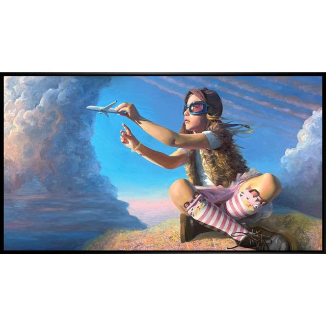 In "Cruising Altitude," a young girl dons aviator goggles and a playful expression as she reaches out towards a distant...