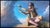 In "Cruising Altitude," a young girl dons aviator goggles and a playful expression as she reaches out towards a distant...