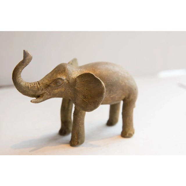 :: Vintage handmade African elephant sculpture. Circa late mid 20th century, though possibly older, this piece has such...