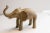 :: Vintage handmade African elephant sculpture. Circa late mid 20th century, though possibly older, this piece has such...