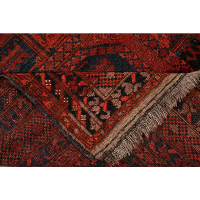 Vintage hand-knotted Turkmen rug with a geometric design. This piece has great detailing and would be perfect for any...